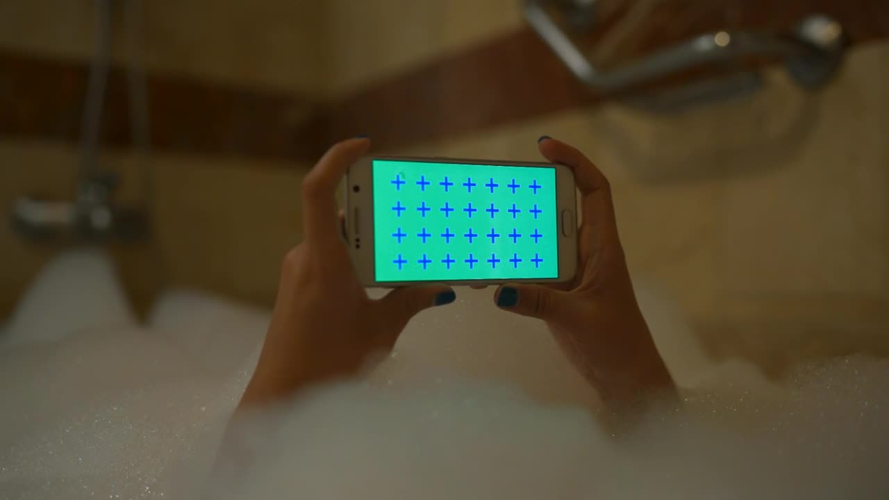 Video Stock Person With His Cell Phone In A Foam Bath Live Wallpaper Free