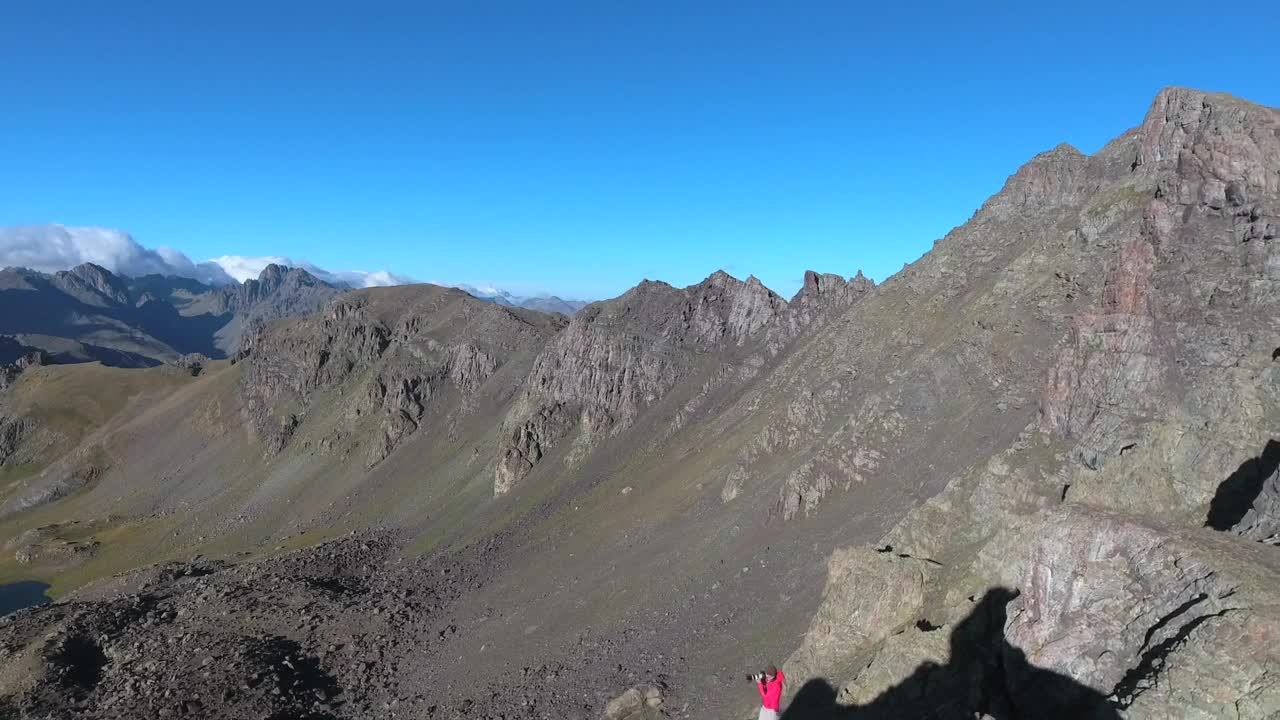 Video Stock Photographer At The Peak Of A Mountain Live Wallpaper Free