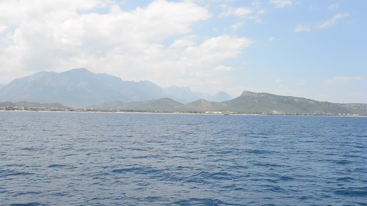 Video Stock Photographer Looking Back Towards An Island Live Wallpaper Free