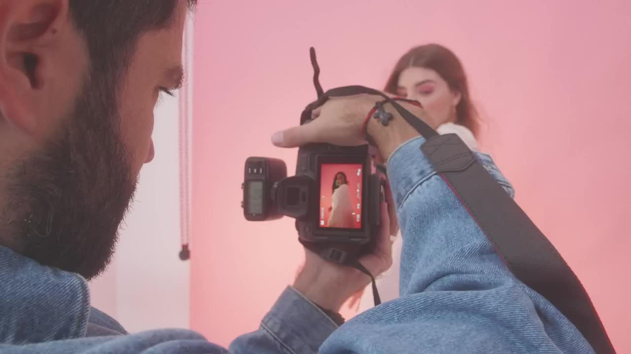 Video Stock Photographer Portraying A Young Female Model Live Wallpaper Free