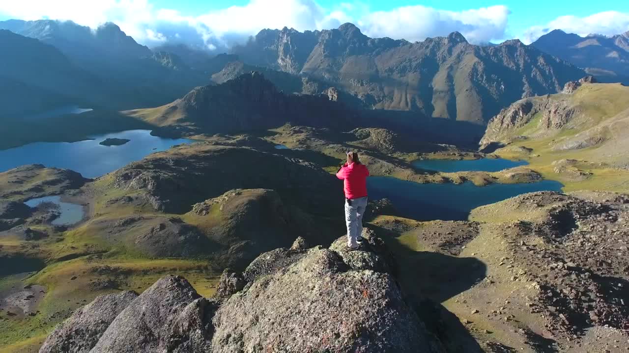Video Stock Photographer Working At The Top Of A Mountain Peak Live Wallpaper Free