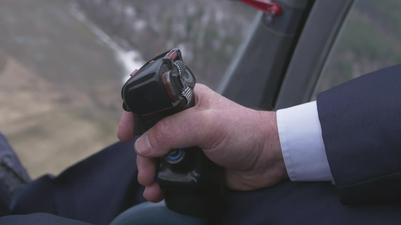 Video Stock Pilot Holding The Controls Of A Helicopter Live Wallpaper Free