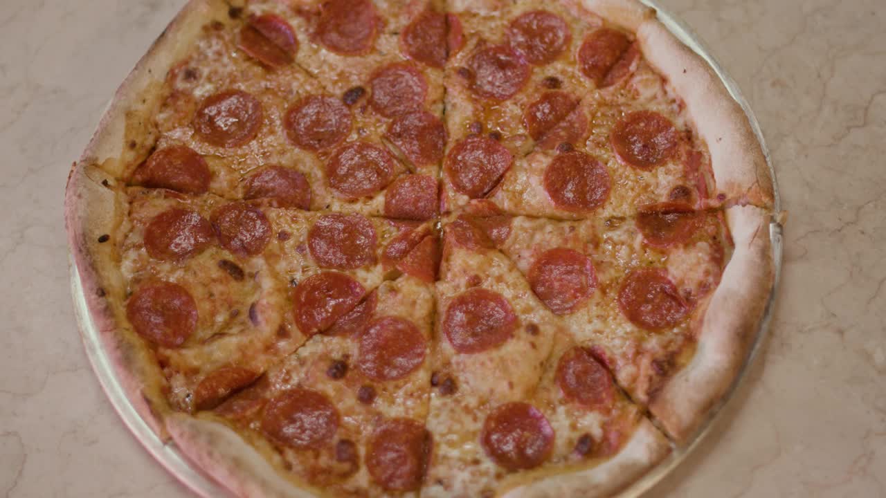 Video Stock Pizza While Someone Takes A Slice Live Wallpaper Free