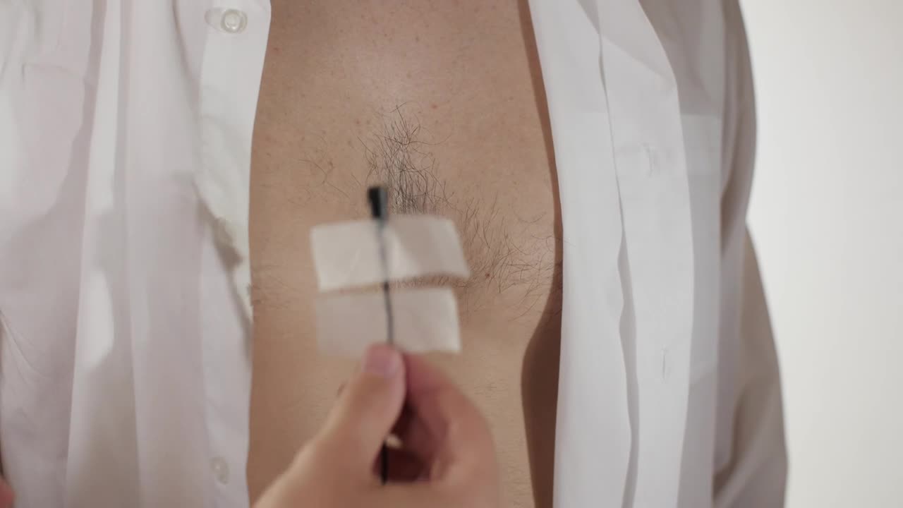 Video Stock Placing A Microphone On A Spys Chest Live Wallpaper Free