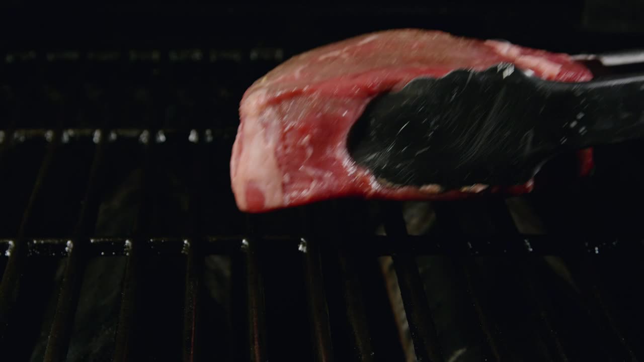 Video Stock Placing Beef On A Cold Grill Live Wallpaper Free