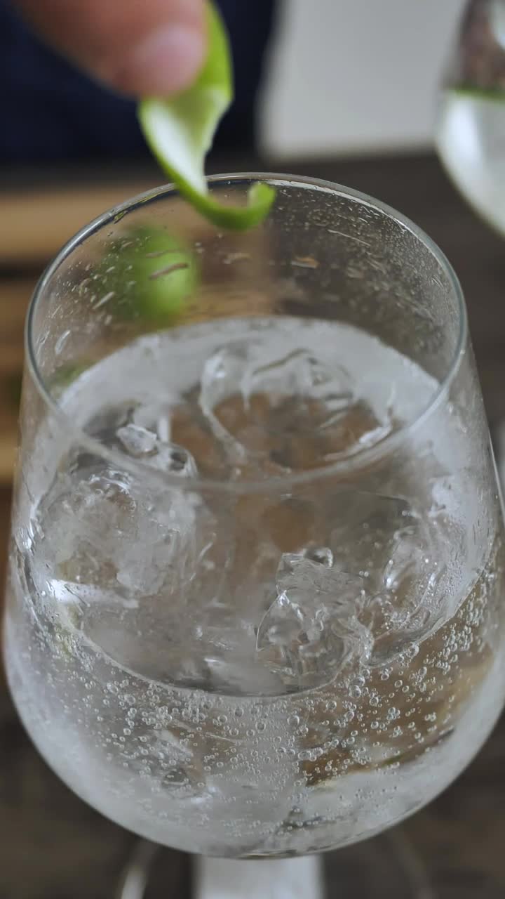 Video Stock Placing Lemon Peel In A Glass Live Wallpaper Free