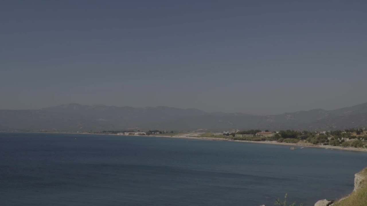 Video Stock Plane Takes Off From A Beach Town Live Wallpaper Free