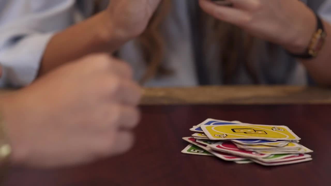 Video Stock Playing A Game Of Uno With Friends Live Wallpaper Free