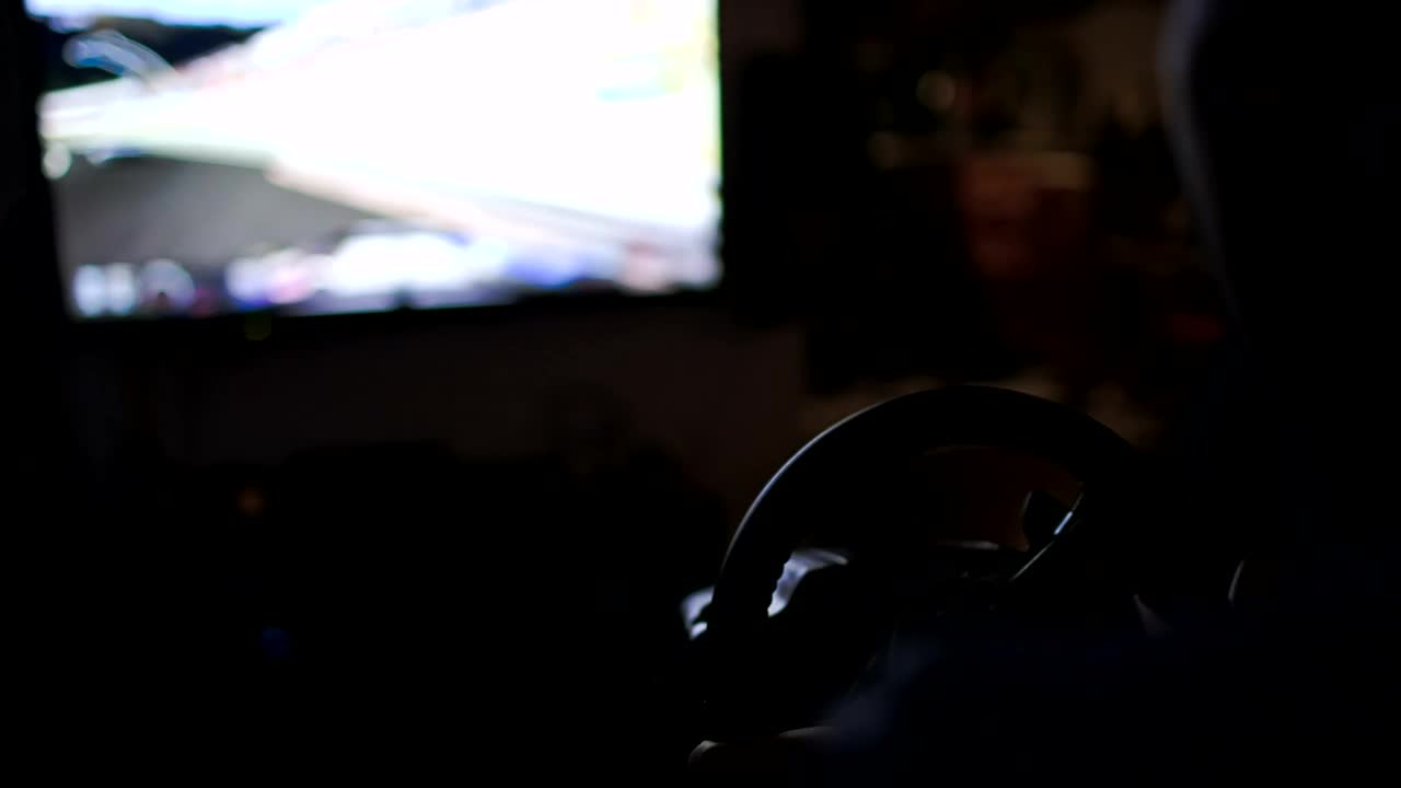 Video Stock Playing A Racing Game With A Wheel Live Wallpaper Free