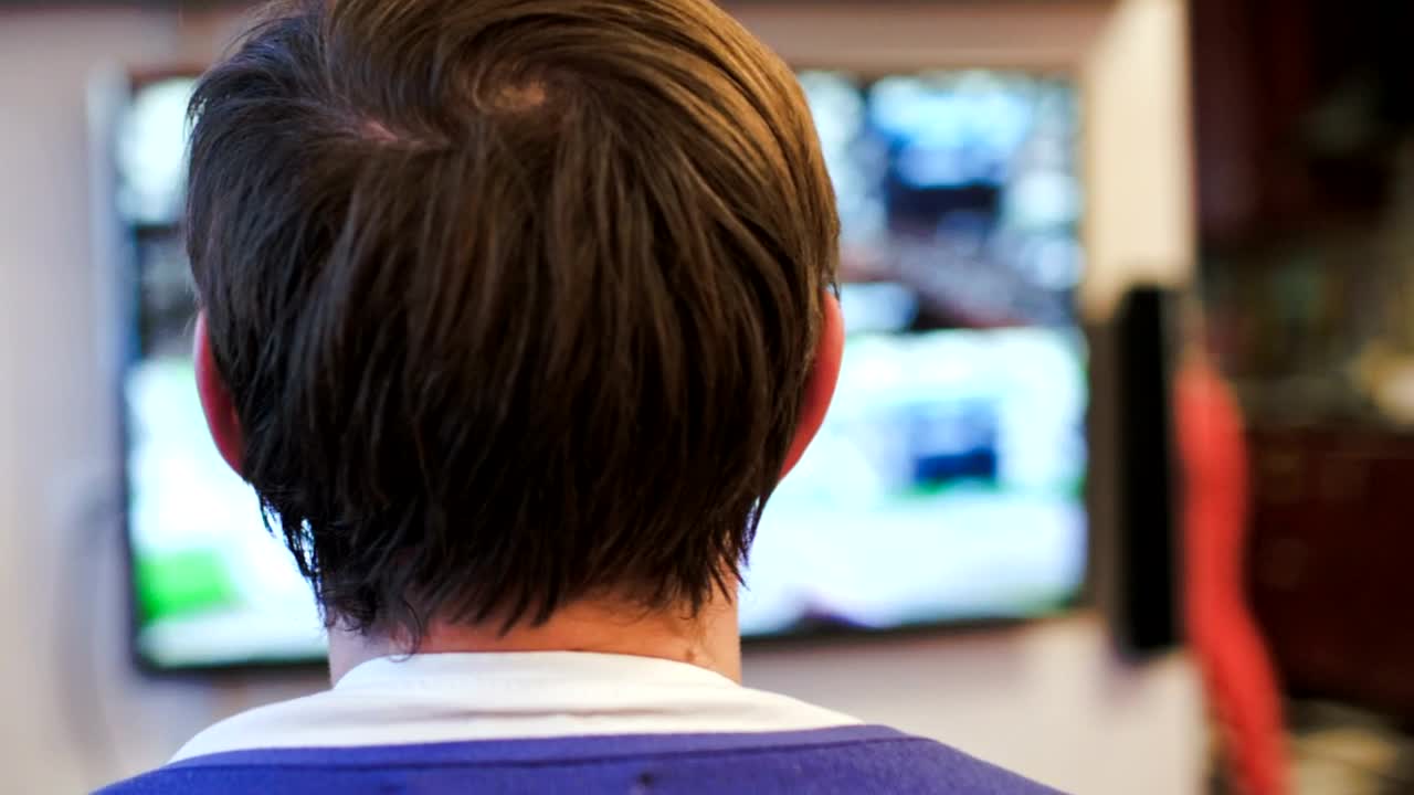 Video Stock Playing A Video Game On Tv Live Wallpaper Free