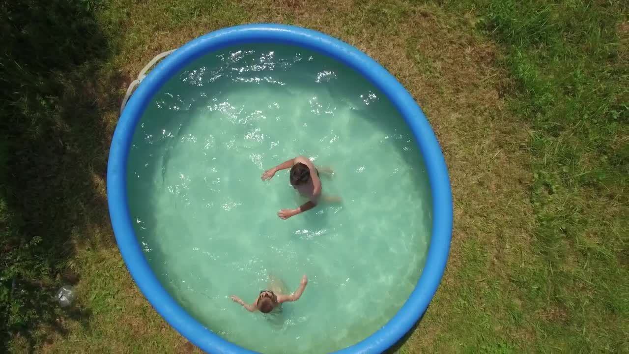 Video Stock Playing In An Inflatable Pool Live Wallpaper Free