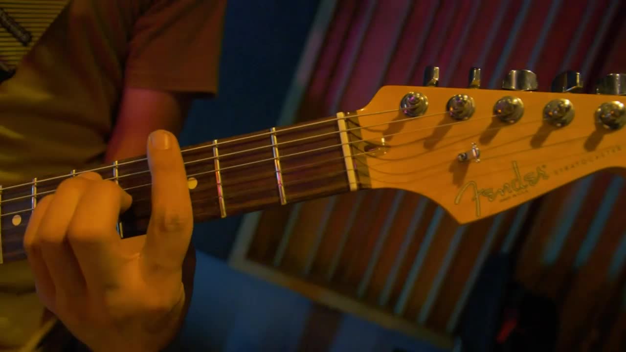 Video Stock Playing The Electric Guitar During A Presentation Live Wallpaper Free