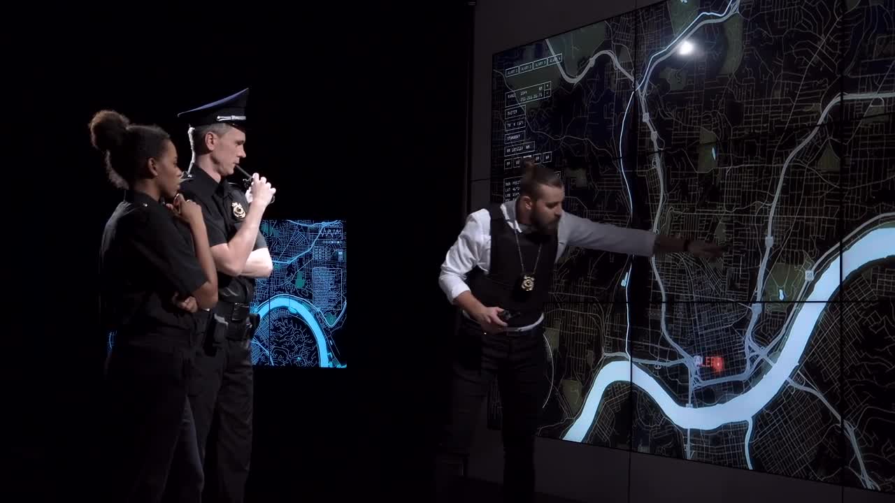 Video Stock Police Officers Watching An Alert On A Map Live Wallpaper Free