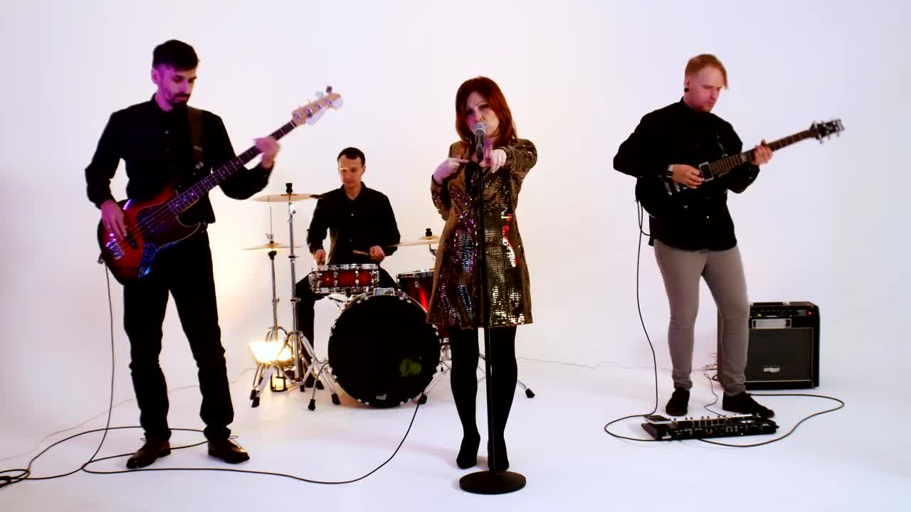 Video Stock Pop Band Performing At A Photo Studio Live Wallpaper Free
