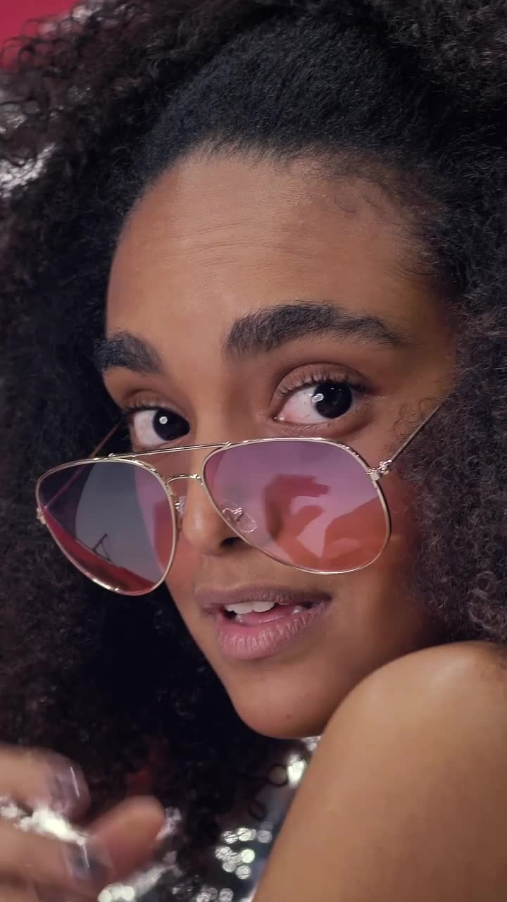 Video Stock Portrait Of A Captivating Young Woman Wearing Sunglasses Live Wallpaper Free