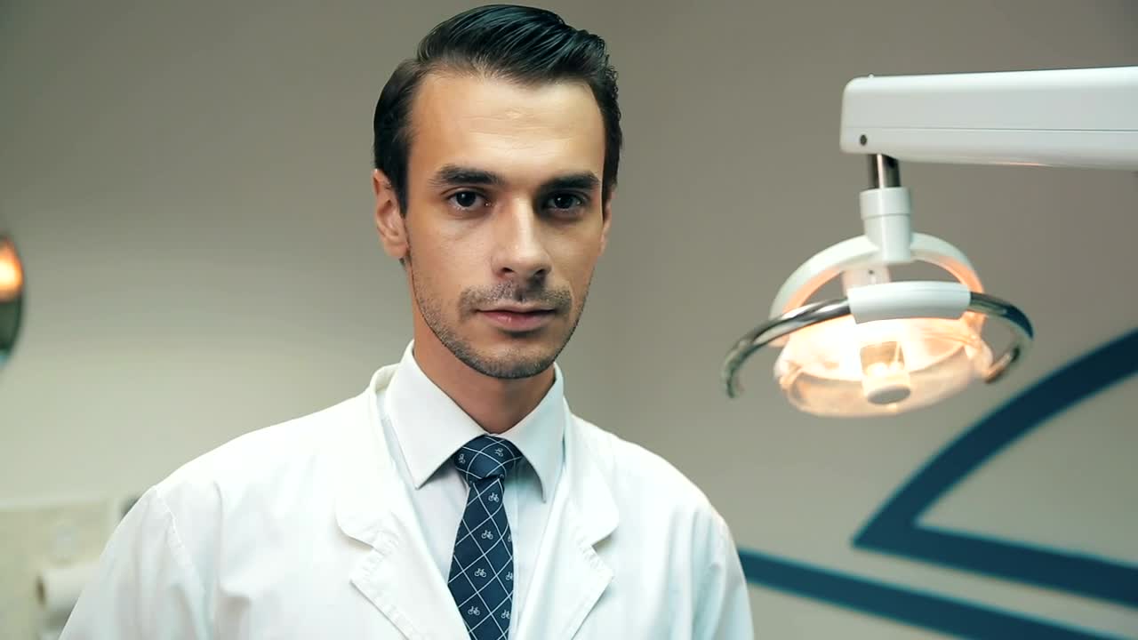 Video Stock Portrait Of A Dentist In His Dental Office Live Wallpaper Free