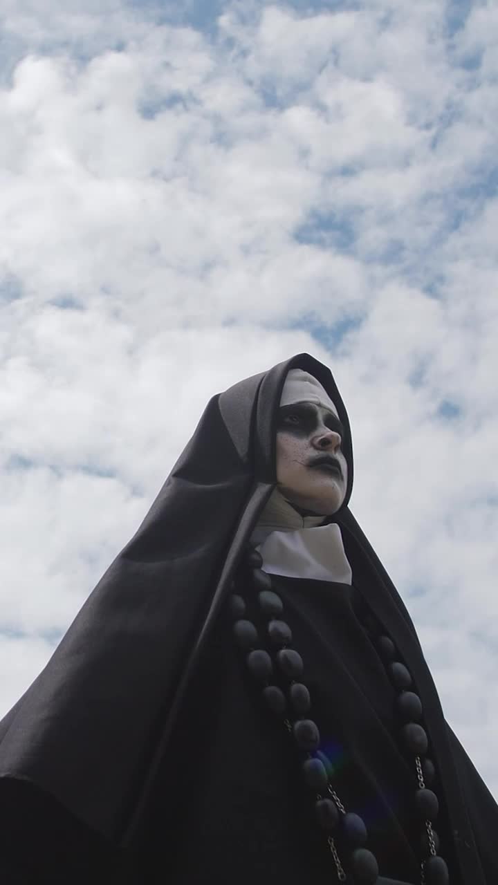 Video Stock Portrait Of A Devilish Nun Smiling Live Wallpaper Free