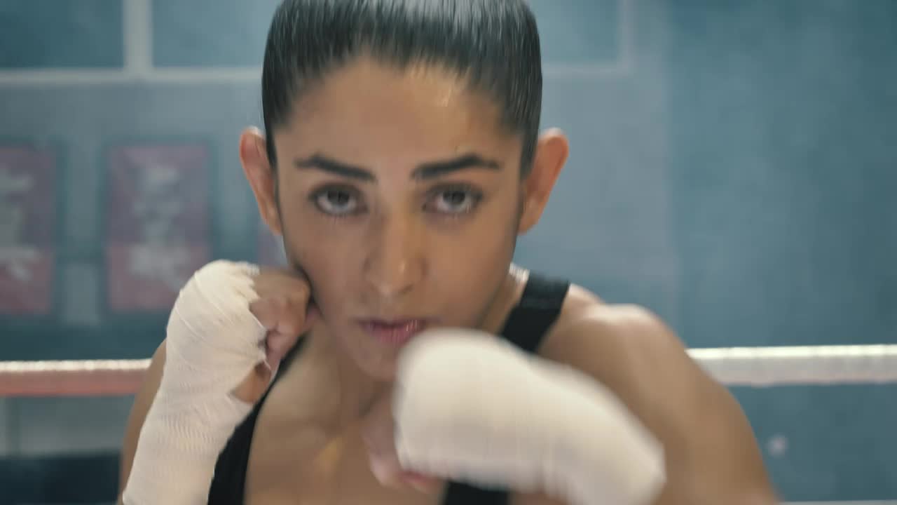 Video Stock Portrait Of A Female Boxer Training On The Ring Live Wallpaper Free