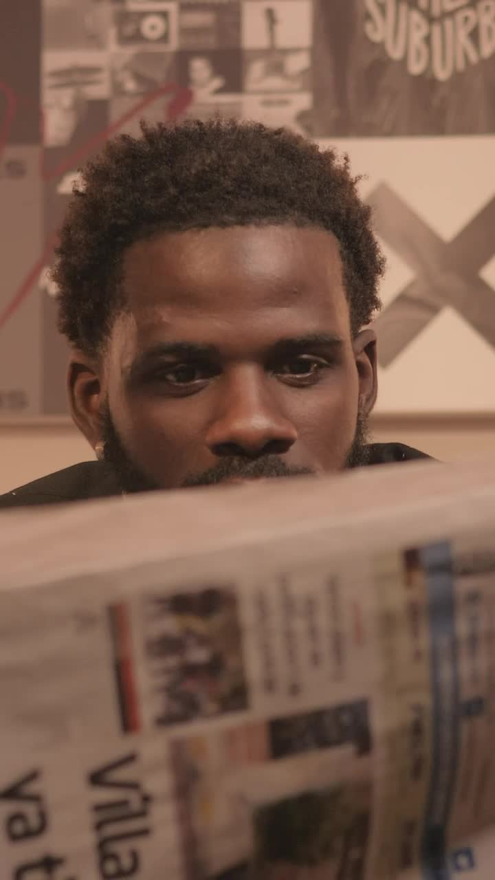 Video Stock Portrait Of A Focused Man Reading The News Of The Live Wallpaper Free