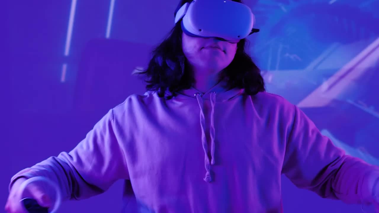 Video Stock Portrait Of A Gamer Playing With Vr Glasses Live Wallpaper Free