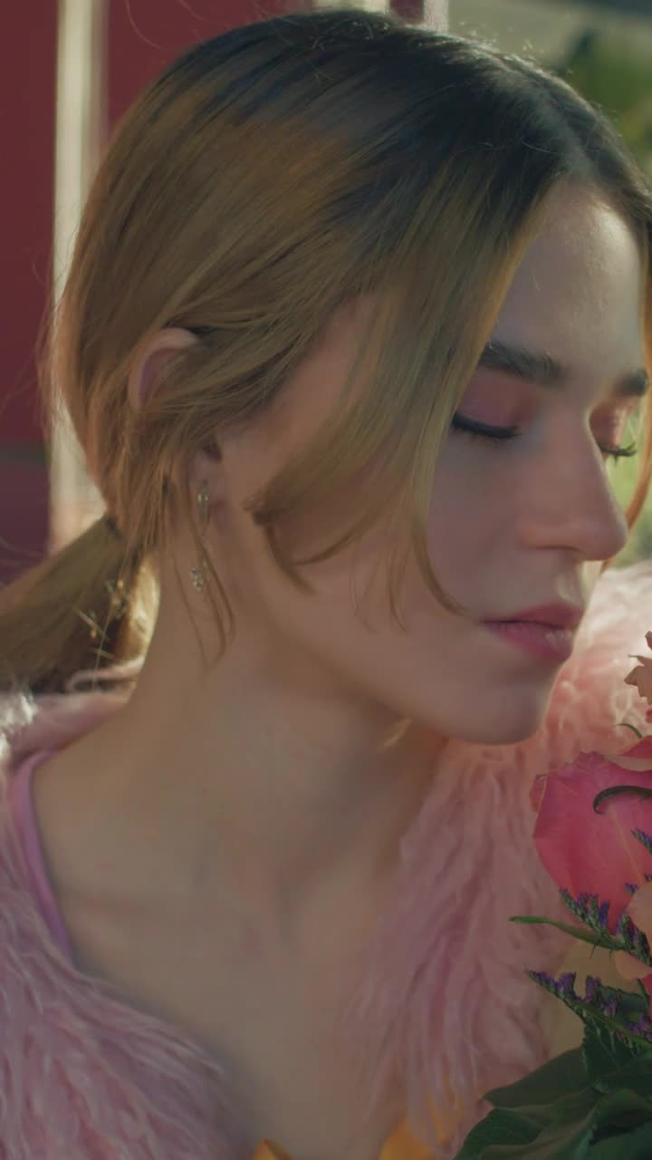 Video Stock Portrait Of A Girl Smelling Flowers Live Wallpaper Free