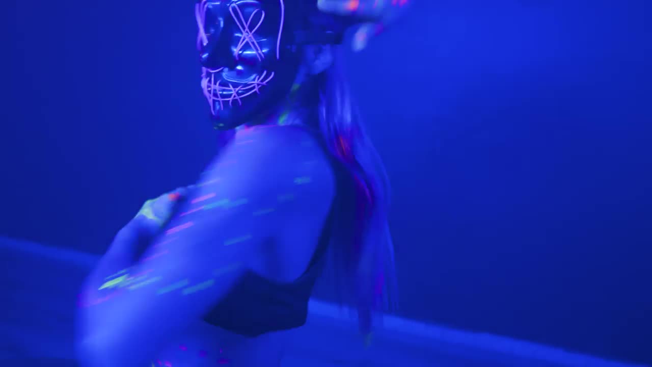 Video Stock Portrait Of A Girl With A Neon Mask Dancing Dynamically Live Wallpaper Free