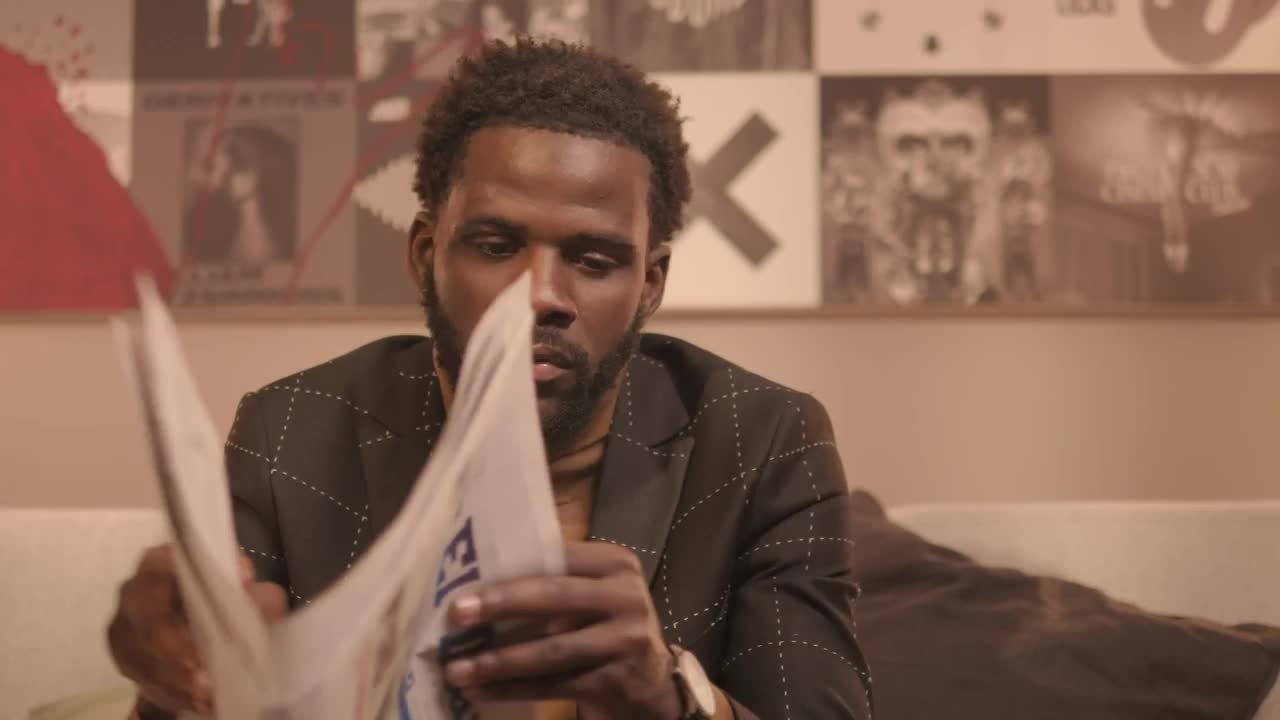 Video Stock Portrait Of A Man Leafing Through A Newspaper Live Wallpaper Free