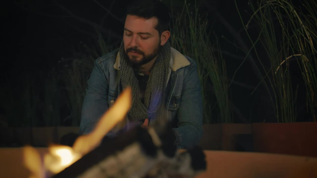 Video Stock Portrait Of A Man Warming His Hands By A Campfire Live Wallpaper Free