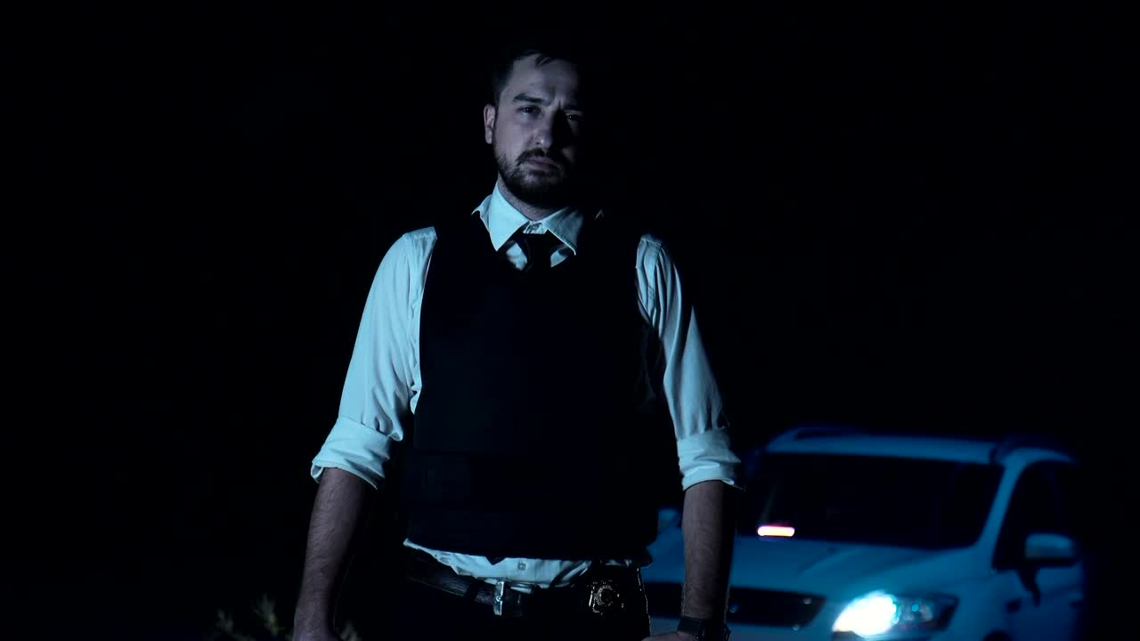 Video Stock Portrait Of A Police Officer With A Vest And With Live Wallpaper Free