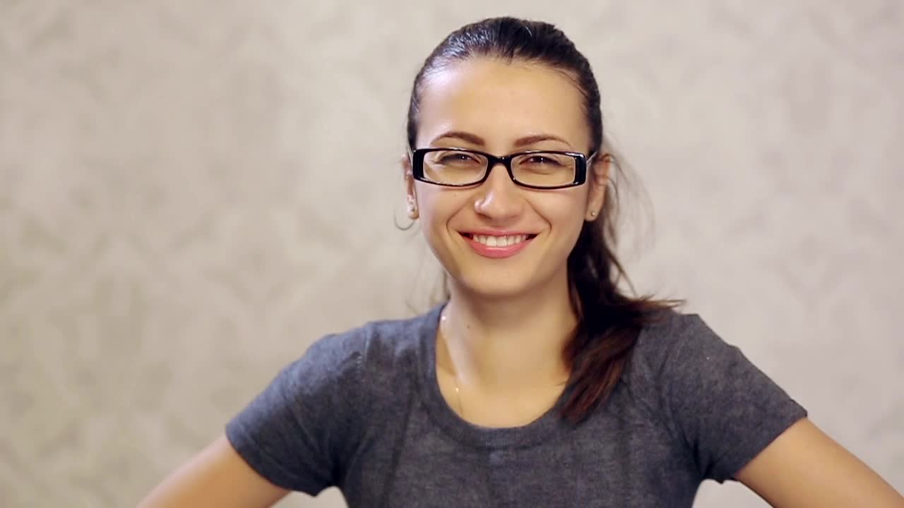 Video Stock Portrait Of Woman With Glasses Smiling Live Wallpaper Free