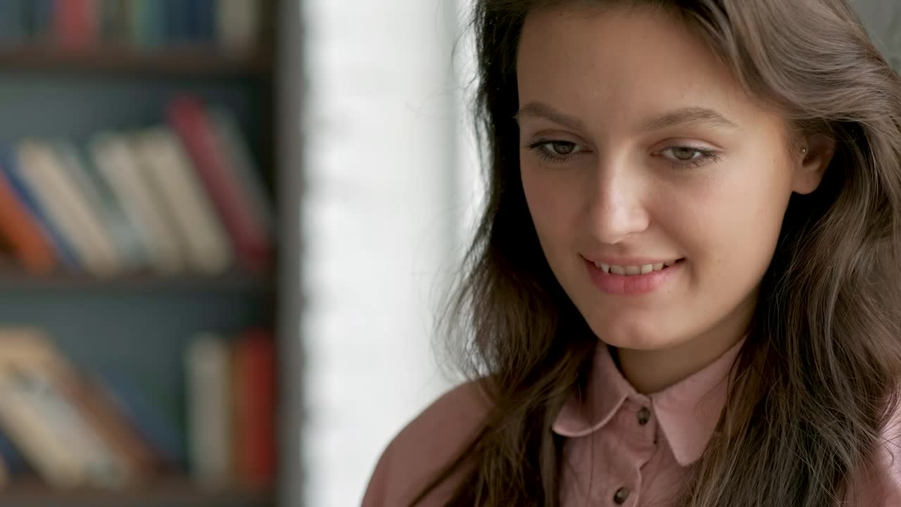 Video Stock Portrait To A Young Student In A Library Live Wallpaper Free