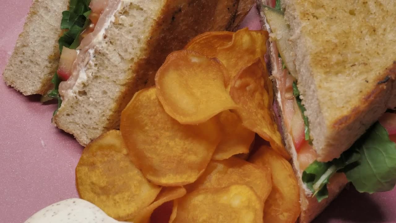 Video Stock Potato Chips Arrangement And A Sandwich Split In Two Live Wallpaper Free