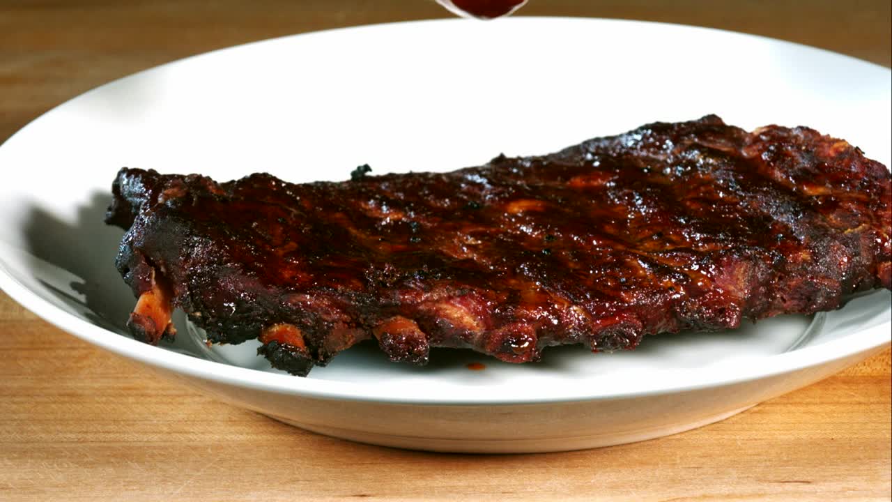 Video Stock Pouring Barbecue Sauce On Ribs Live Wallpaper Free
