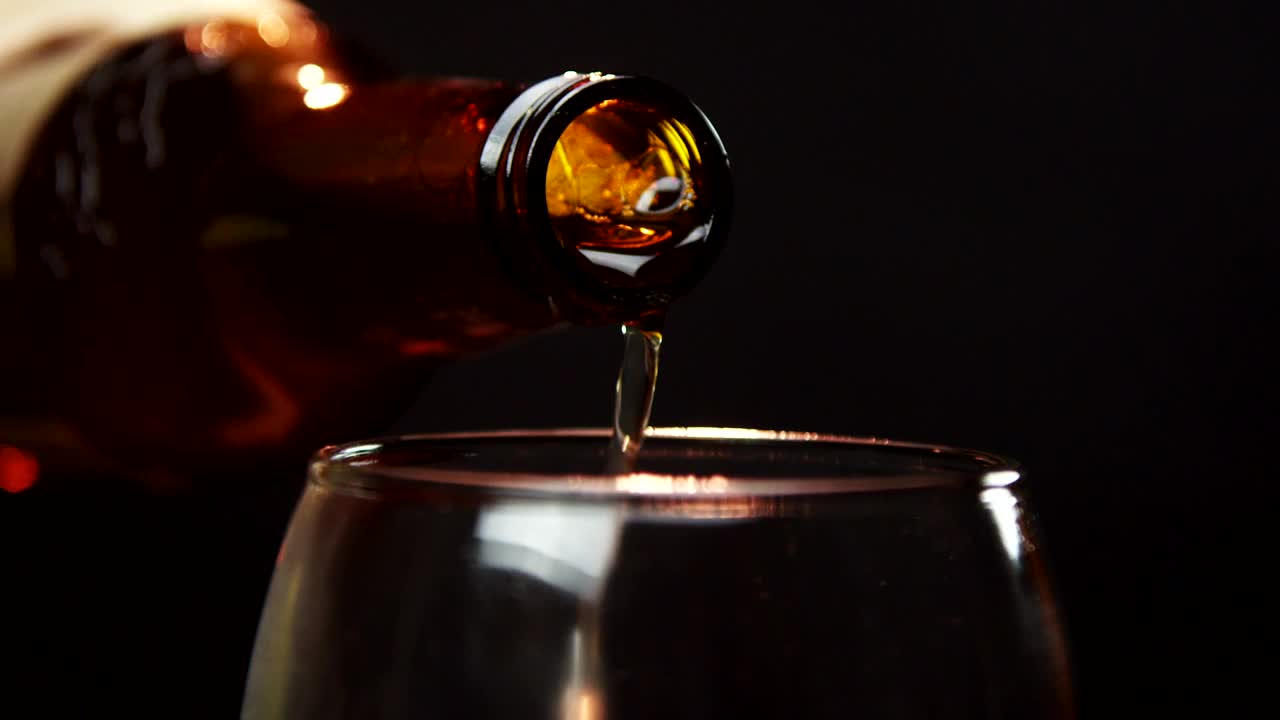 Video Stock Pouring Beer From A Glass Bottle Live Wallpaper Free