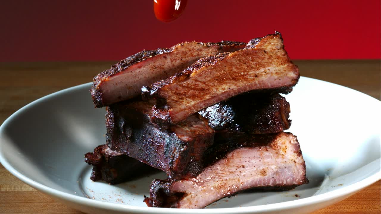 Video Stock Pouring Barbecue Sauce To Ribs On The Plate Live Wallpaper Free