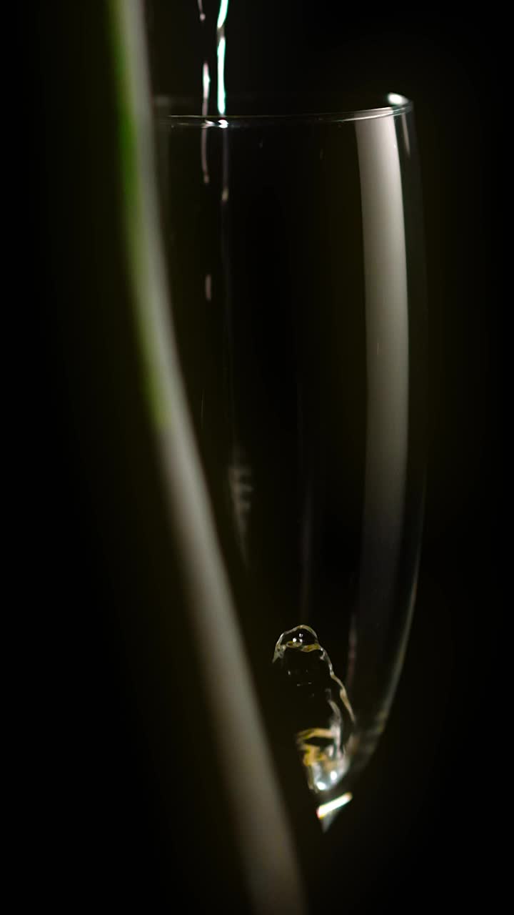 Video Stock Pouring Champagne Into A Glass Goblet On A Dark Background Live Wallpaper Free