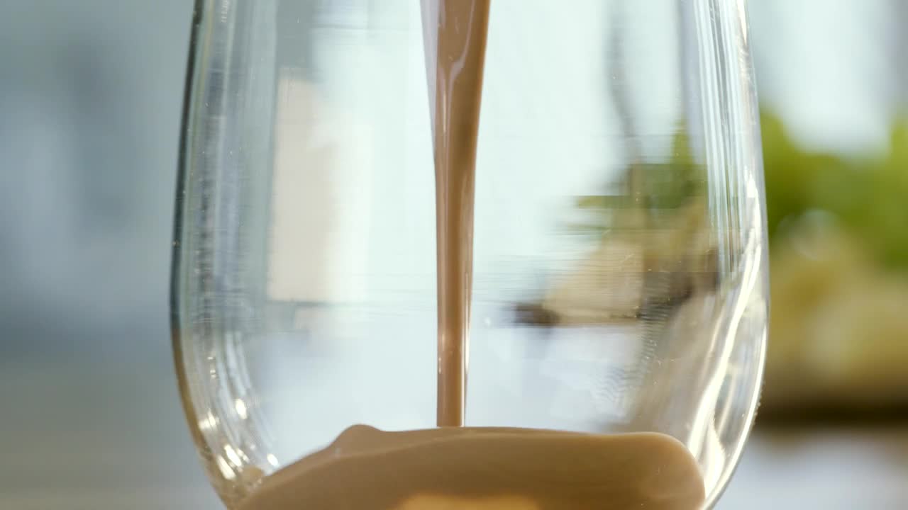 Video Stock Pouring Chocolate Milk Into A Glass Live Wallpaper Free