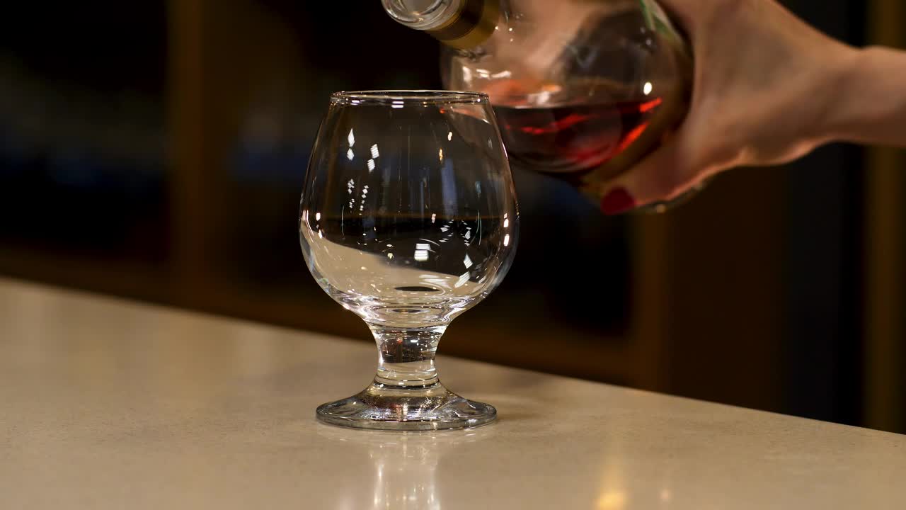 Video Stock Pouring Cognac Into A Glass Live Wallpaper Free