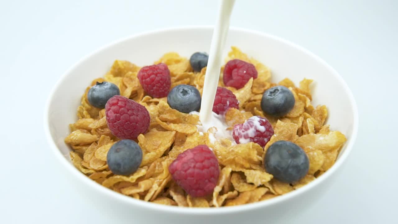 Video Stock Pouring Fresh Milk Over A Bowl Of Cereal Live Wallpaper Free