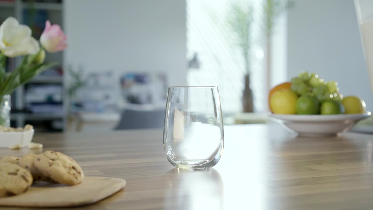 Video Stock Pouring Milk Into A Glass On The Table Live Wallpaper Free