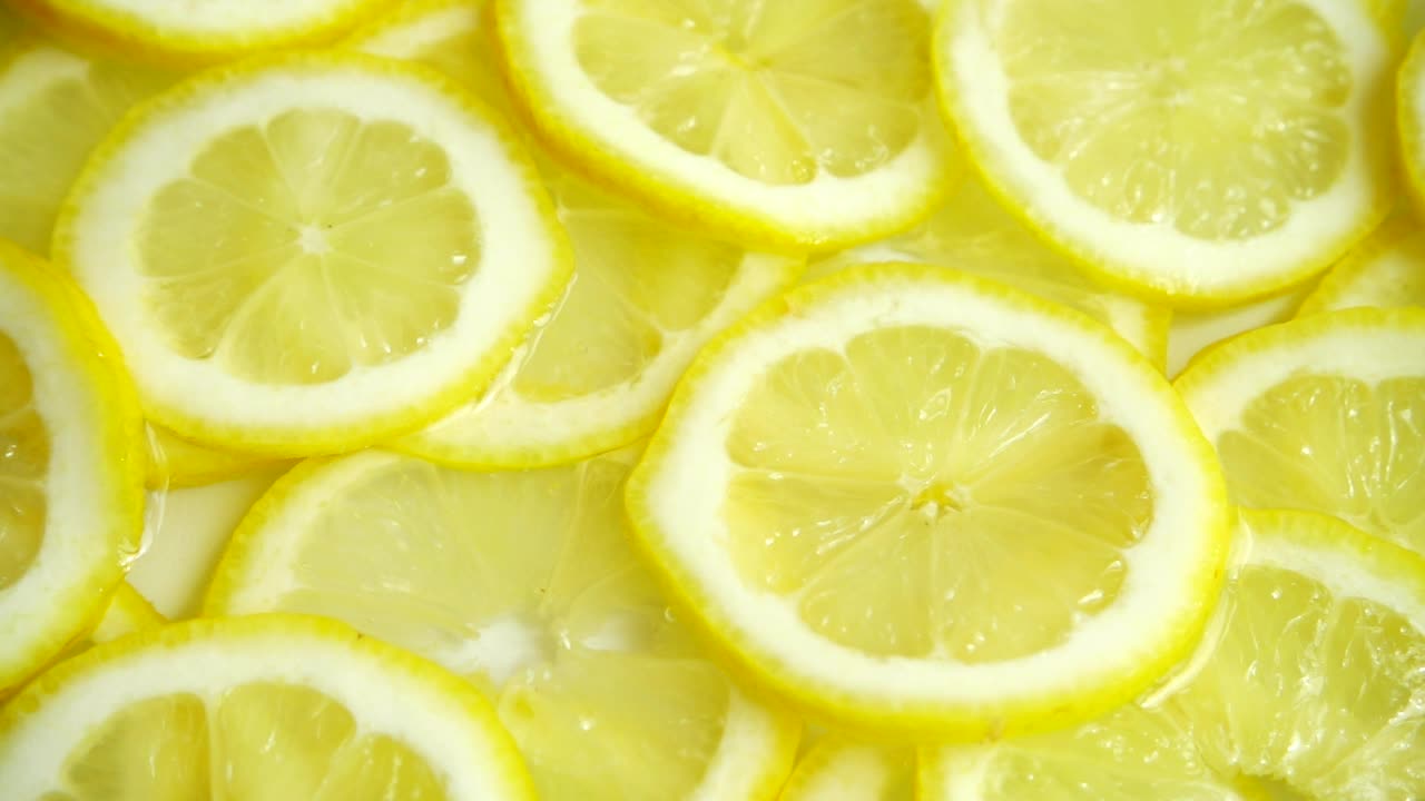 Video Stock Pouring Water On Slices Of Lemon Live Wallpaper Free