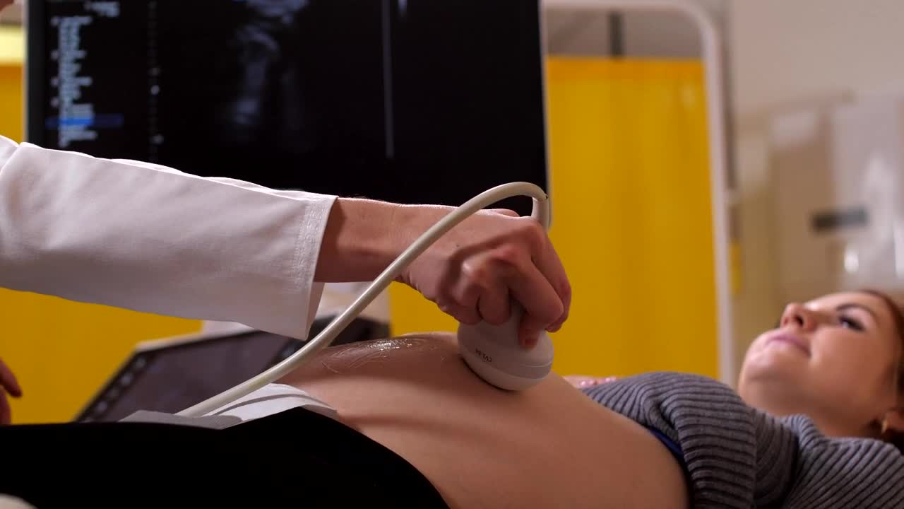 Video Stock Pregnant Woman At An Ultrasound Session Live Wallpaper Free