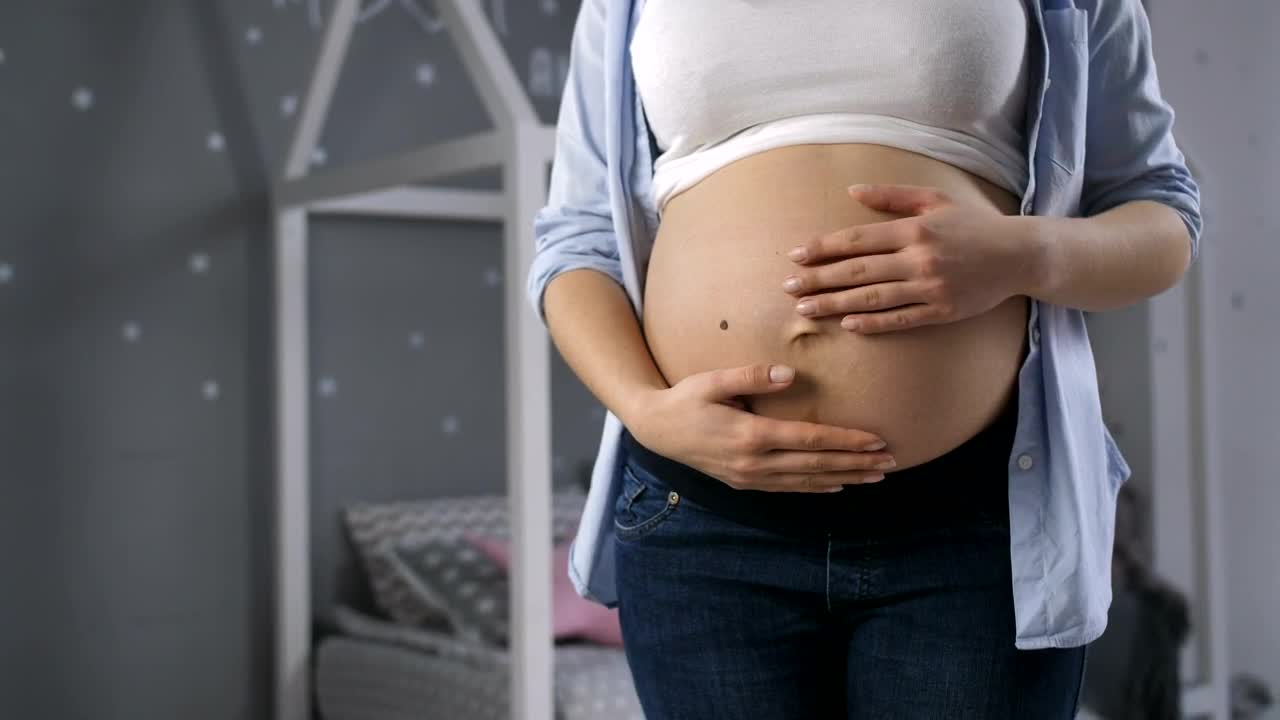 Video Stock Pregnant Woman Holding Her Belly Live Wallpaper Free