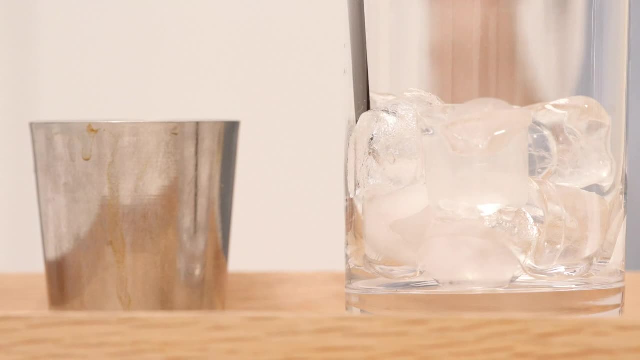 Video Stock Preparing A Cold Beverage With Coffee And Milk In A Live Wallpaper Free