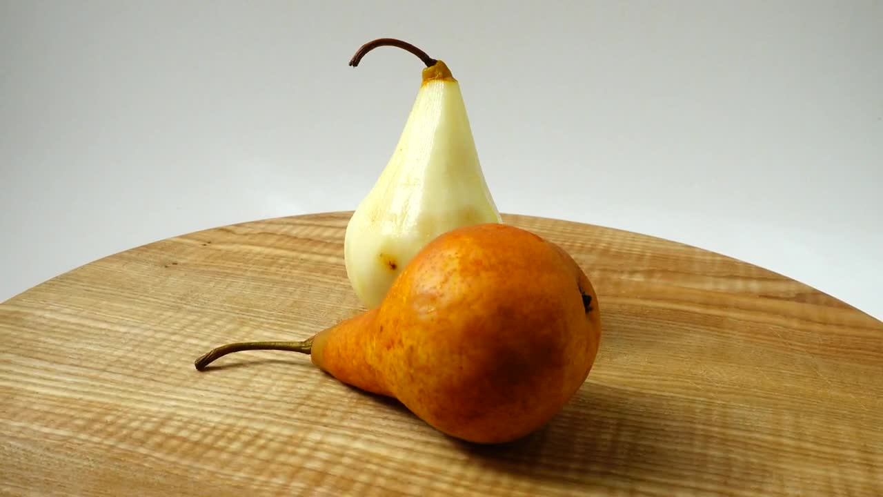 Video Stock Presentation Of Pears Rotating On A Table Live Wallpaper Free