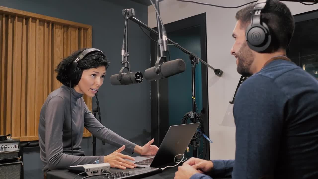 Video Stock Presenters Recording A Podcast Live Wallpaper Free