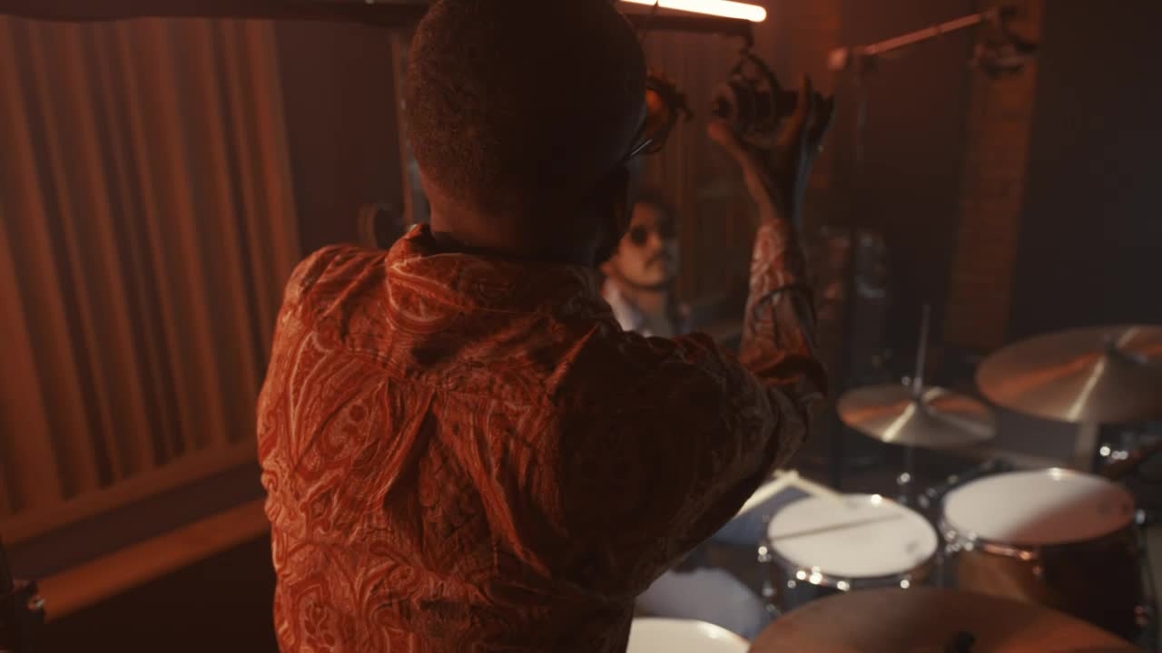 Video Stock Producer Making A Drum Set In A Studio Live Wallpaper Free