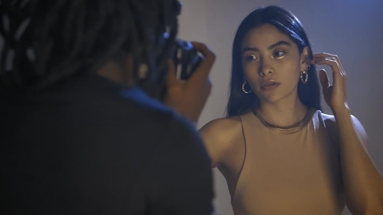 Video Stock Professional Photographer Taking Photos Of A Young Woman Live Wallpaper Free