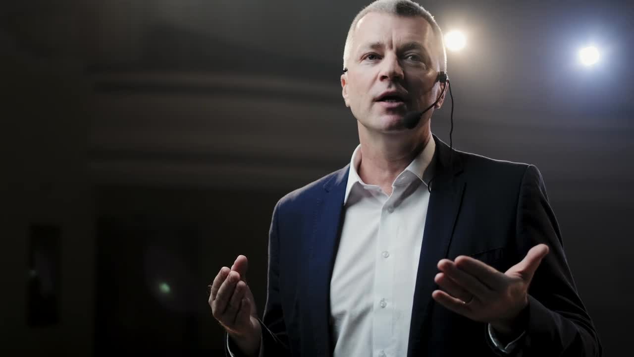 Video Stock Professional Speaker Slowly Explains A Point Live Wallpaper Free