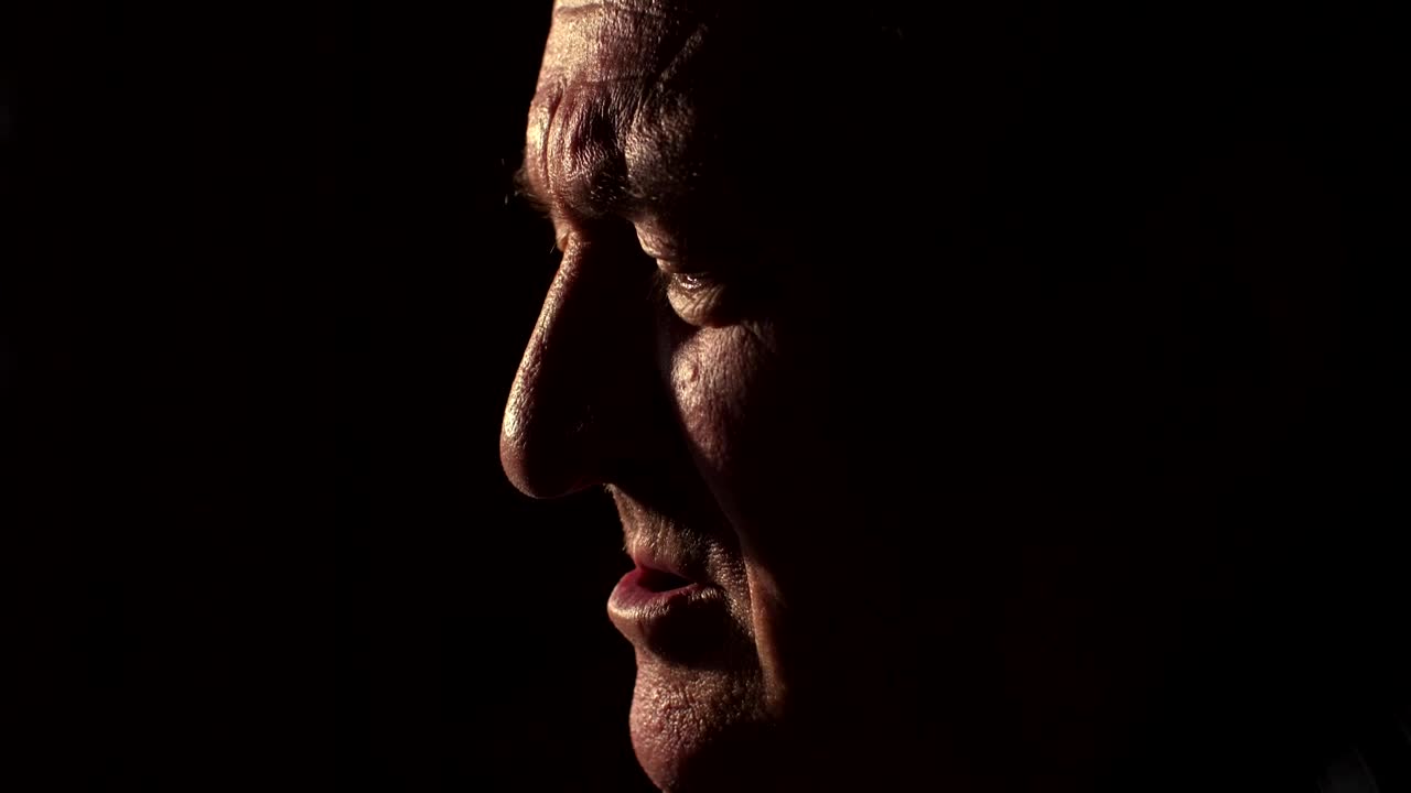 Video Stock Profile Face Of An Sad Old Man In The Dark Live Wallpaper Free